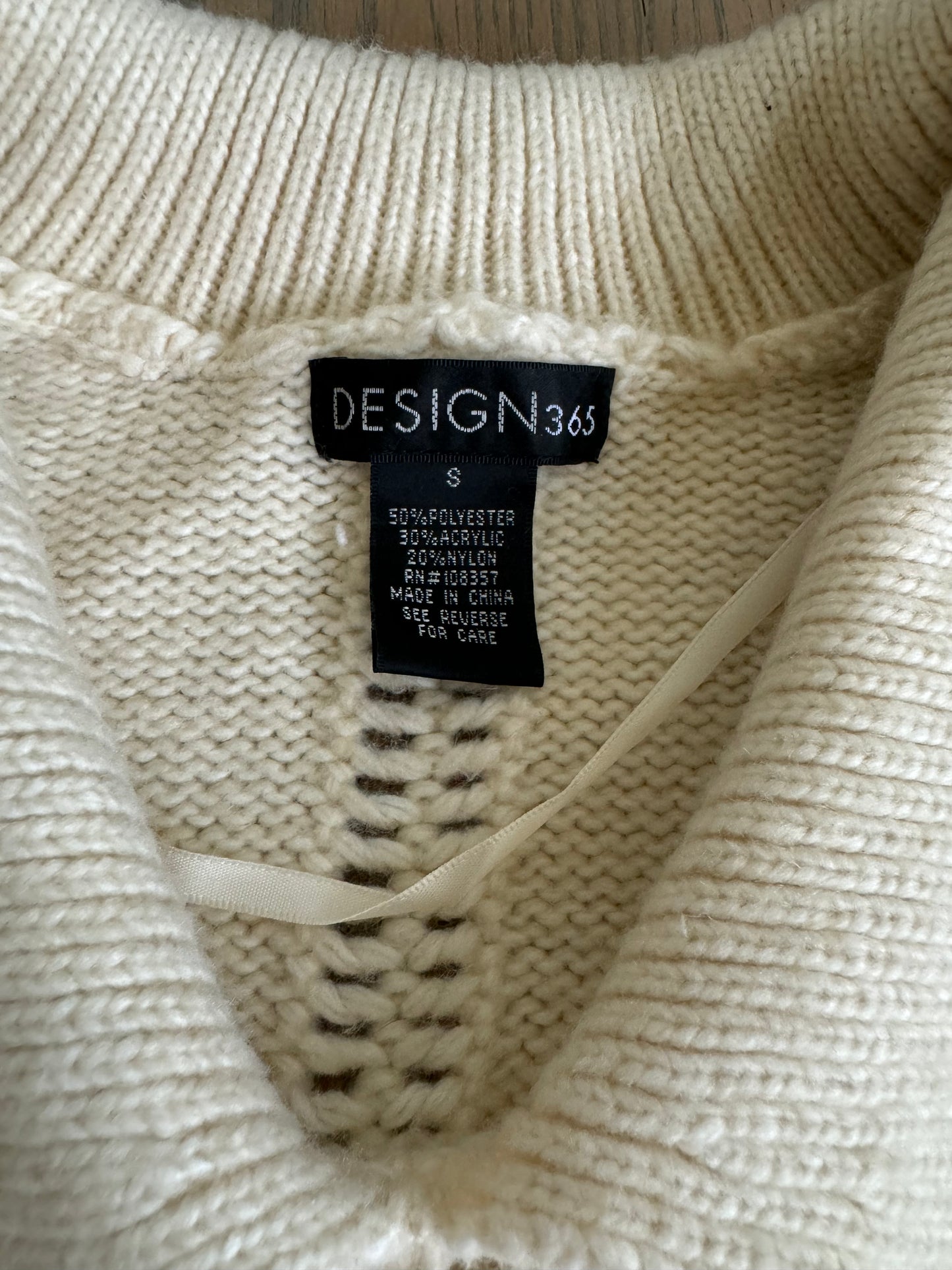 cream sweater - size small