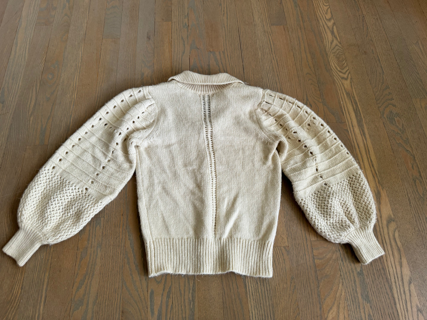 cream sweater - size small