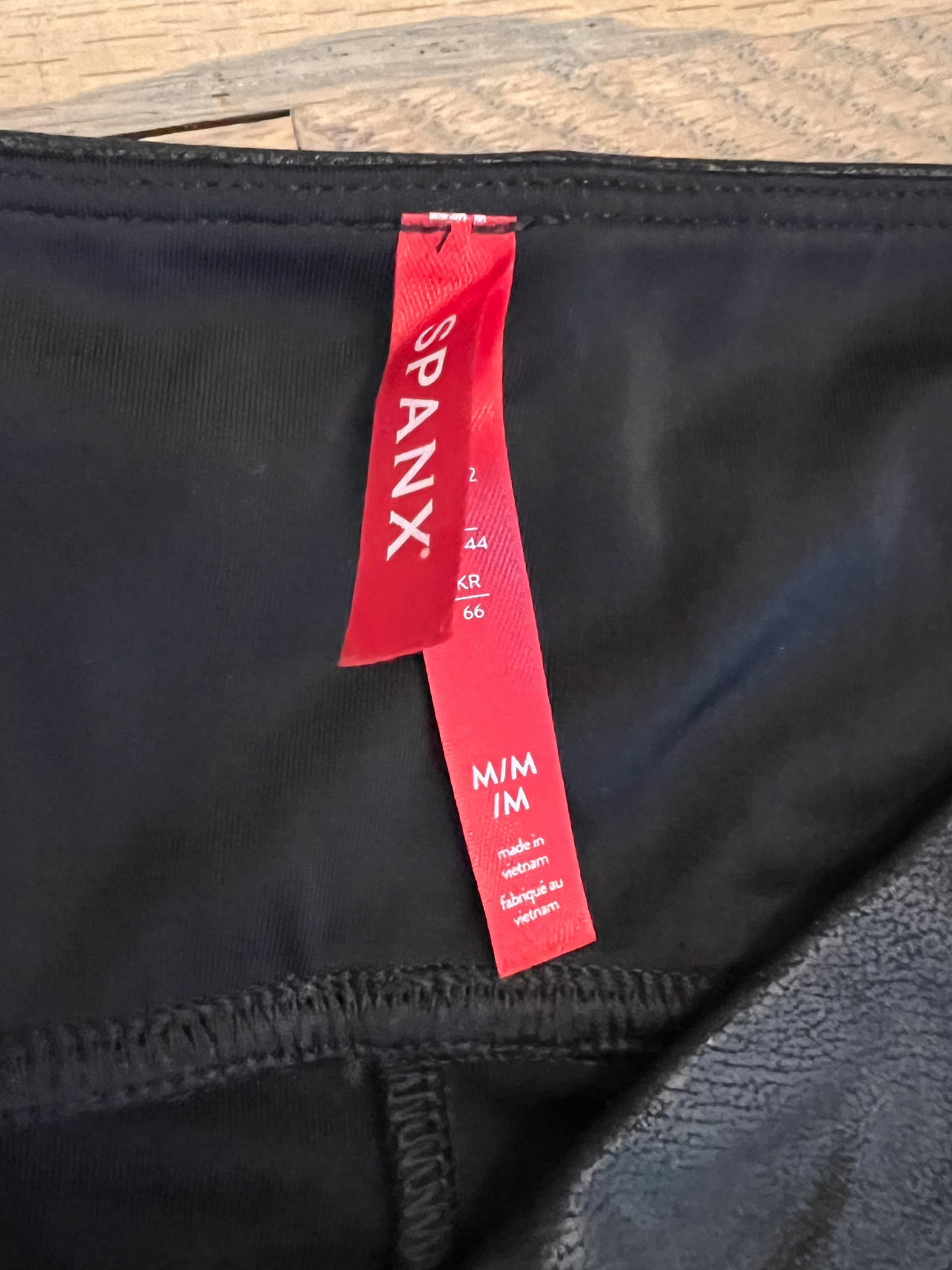 Spanx black faux leather leggings - size Medium NWT